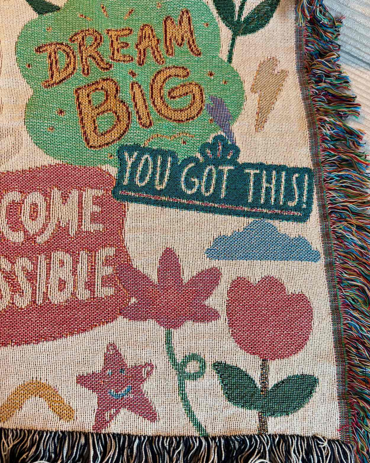 Gewebte Decke mit „Bunte Motivation“